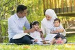 © faizzaki - Malay family at recreational park having fun