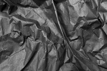 Tissue Black Crumpled Paper Texture. Abstract Background
