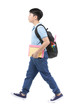 © sirikorn - Smiling little student boy in blue polo t-shirt in with books and bag.