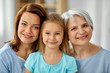 © Syda Productions - family, generation and female concept - portrait of smiling mother, daughter and grandmother at home