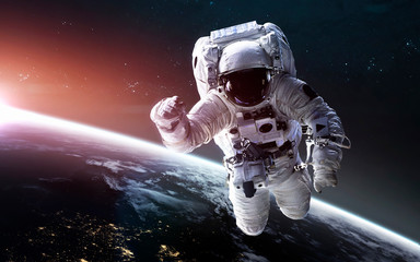 Wall Mural - look on our planet from orbital international space station iss, astronaut at spacewalk. elements of