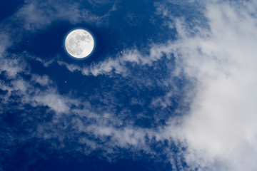  Full moon with starry and clouds background. Romantic night.