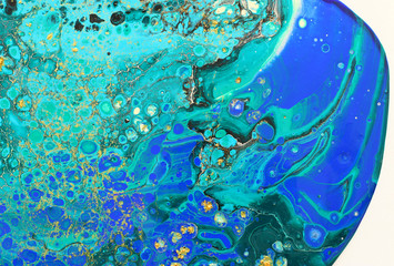 Abstract marbleized effect background. Blue creative colors. Beautiful paint with the addition of gold