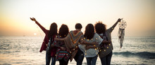 Romance And Emotion Concept With Group Of People Women Friends Viewed From Back Hugging And Ejoying The Sunset In Outdoor Nature Sea Vacation Concept - Friendship And Freedom For Travelers