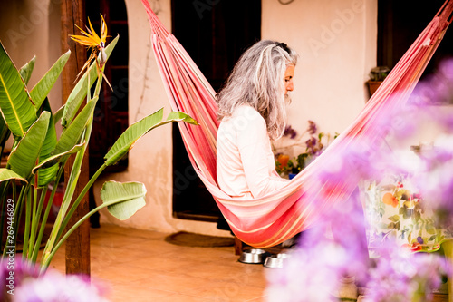 Old Beautiful Grey White Hair Woman Sit Down Outdoor On Hammock