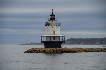 Lighthouse at port entrance in Portland, Maine