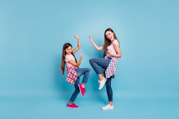 Poster - Full length body size view portrait of two nice charming attractive lovely cheerful cheery ecstatic straight-haired girls having fun rejoice isolated on bright vivid shine blue turquoise background