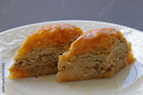 Turkce Beyaz Tabak Icerisnde Cevizli Baklava Tatlisi 45 10000 Ingilizce Ceviri Yap Googlebing Dessert Baklava With Walnuts In A White Dish Buy This Stock Photo And Explore Similar Images At Adobe