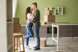 © Pixel-Shot - Adorable loving couple after moving into new house