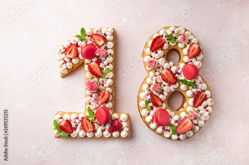 Photographie Number 18 naked honey cake for Birthday, pink background