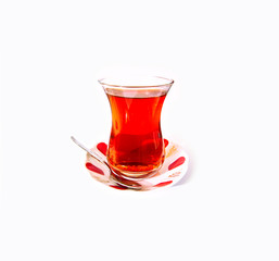 Glass of Turkish tea isolated on white