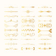 © Kirill - Set of vintage hand drawn golden dividers and lines. Gold fancy borders and elegant laurels. Vector isolated flourish elements.