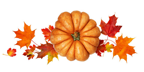 Wall Mural - round pumpkin with autumn colorful leaves