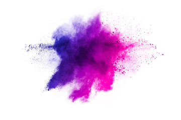 Wall Mural - Freeze motion of purple color powder exploding on white background.