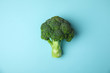 Fresh green broccoli on color background, top view. Organic food