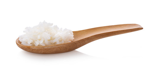 cooked rice in wood spoon on isolated white background