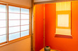 Traditional japanese house or ryokan with closed sliding door window and alcove with hanging scroll and red yellow color
