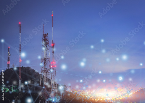 Fotomural Telecommunications tower city at night .communication concept