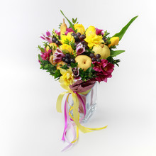 Bright Bouquet Of Yellow And Purple Flowers And Apples And Pears Stands In A Vase On A White Background