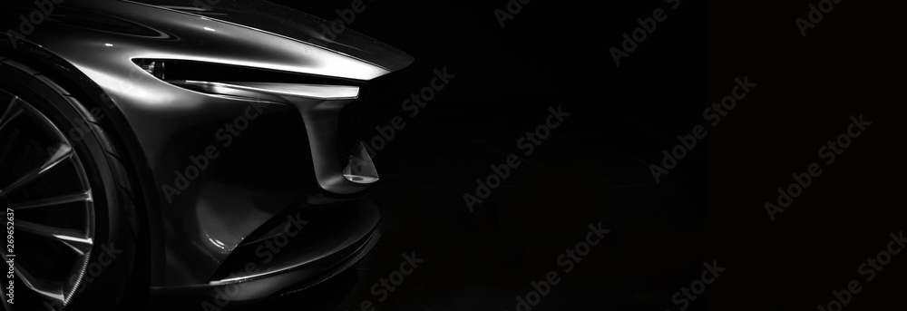 Detail on one of the LED headlights modern car on black background,copy space - obrazy, fototapety, plakaty 