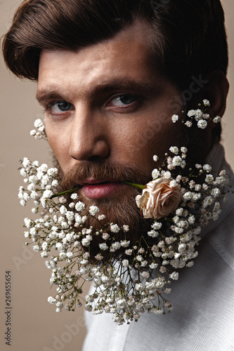 Men With Flowers In Their Beards Buy This Stock Photo And