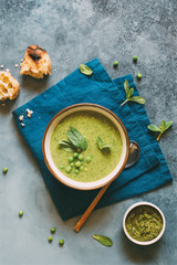 Wall Mural - Green pea cream soup with mint. Vegetarian healthy soup