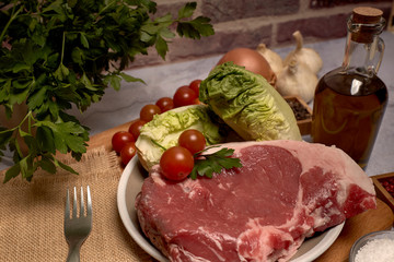 red veal chop on a plate