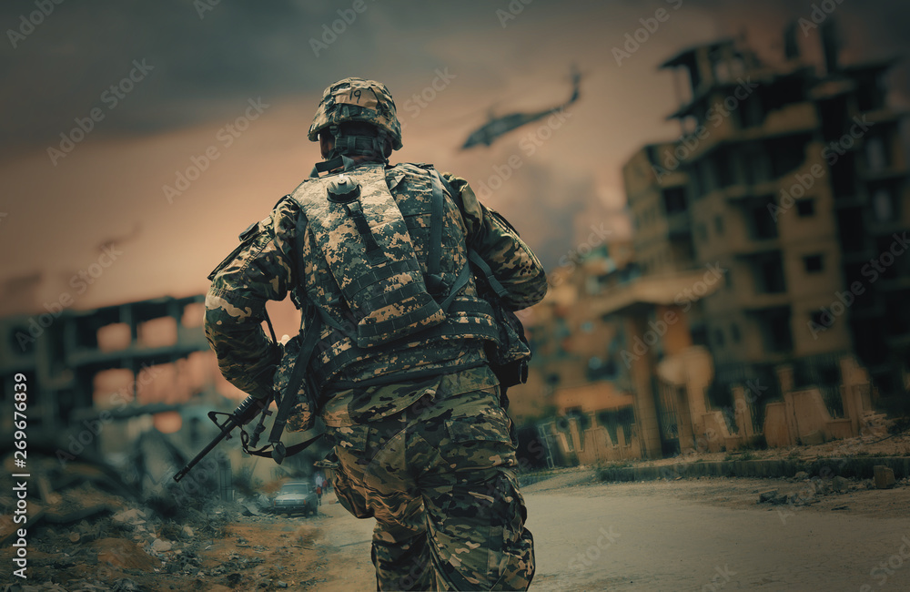 Soldier running in destroyed city to reach the helicopter to escape - obrazy, fototapety, plakaty 