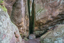 Crack Split Of Stone Rock. Ternoshorska Lada. Dovbush Rocks. Carpathian, Kosiv Raion, Ivano-Frankivsk Oblast, Ukraine