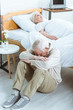 © LIGHTFIELD STUDIOS - sad senior man and senior woman in coma in hospital