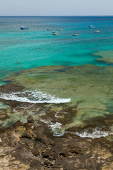 Bajos costeros y barcas de pesca en pueblo El Puertito de la Cruz. Península de Jandía. Isla Fuerteventura. Provincia Las Palmas. Islas Canarias. España