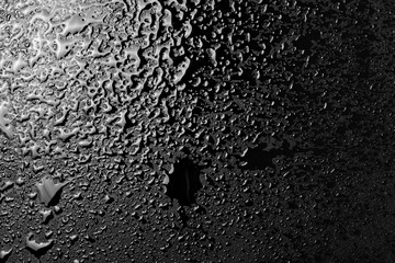 Wall Mural - Water droplets on black background and  texture, top view