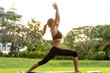 © Rock and Wasp - girl doing yoga at sunset in Thailand in the park
