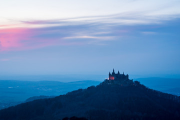 Germany, Afterglow red sky decorating magic hohenzollern castle in the evening