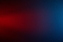 Red Cone-shaped Beam Of Light On A Dark Red And Blue Background