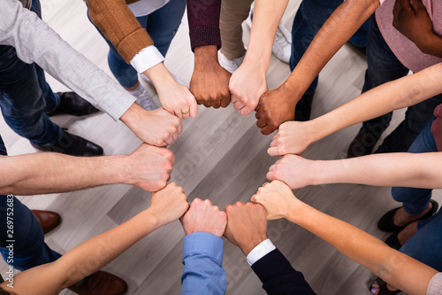 Fotomural People Hands Joining Their Fist To Form Circle