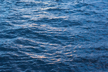  Beautiful sunset on the background of the sea with a purple shade