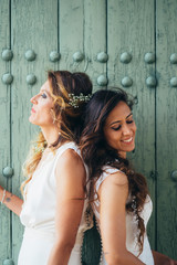 Portrait of two young women getting married