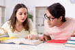 © Elnur - Students preparing for exam together at home
