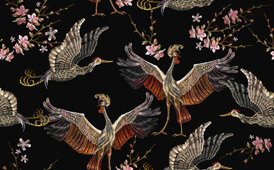  Embroidery crane birds and sakura flowers seamless pattern. Asian template for clothes, textiles, t-shirt design. Japanese art