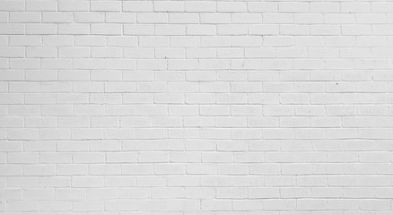  White wall background made of real bricks