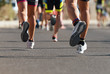 © pavel1964 - Marathon running race, people feet on city road
