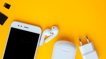 smartphone and wireless headphones. charging and wire included.