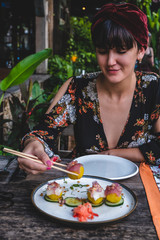 Wall Mural - Raw salmon, tuna canapes. Sashimi appetizers in restaurant