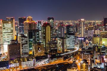 Fototapete - Osaka downtown skyline from Umeda sky building at night