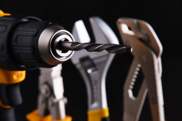  hardware tools including cordless drill and monkey spanner