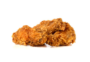 Wall Mural - Fried wings on a white background. Deep-fried chicken wings close-up.