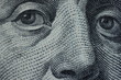 Enigmatic Macro Gaze: The Eyes of Benjamin Franklin on the $100 Bill. Benjamin Franklin's All-Seeing Eyes: A Captivating Macro View.