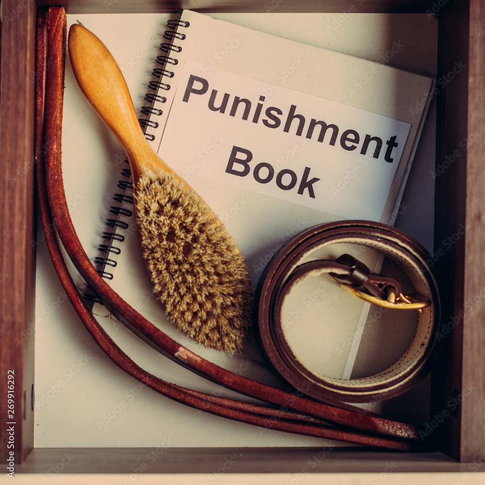 Role play spanking corporal punishment book. vintage school rules concept. brush, belt and  leather tawse for ass spanking. sexual role play. bdsm toys の Stock フォト |  Adobe Stock