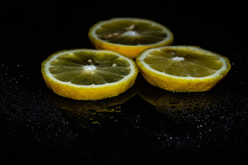 lemon on black background, yellow, black background